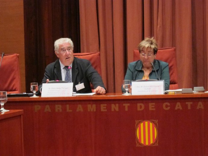 El exdirector general de Unnim y Caixa Terrassa, Enric Mata, y Dolors Montserrat