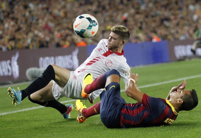 Alberto Moreno (Sevilla) y Alexis Sánchez (Barcelona)