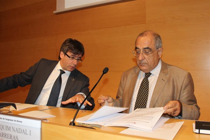 El alcalde de Girona C.Puigdemont y el exalcalde J.Nadal