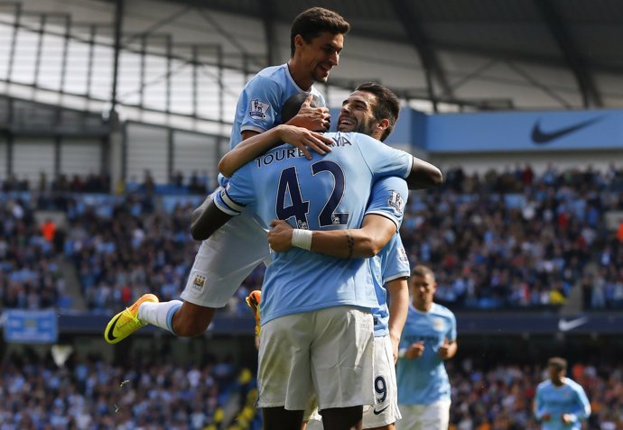 Navas, Negredo y Yaya Touré celebran la victoria del City