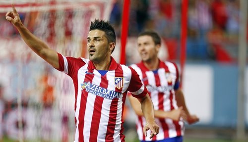 David Villa celebra un gol con el Atlético
