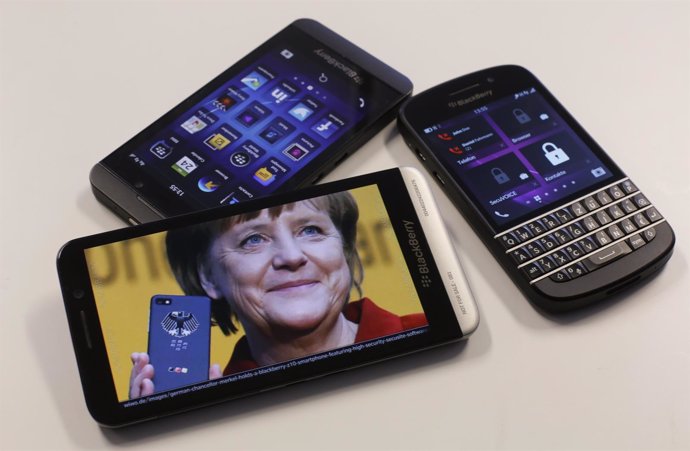 Teléfonos móviles con la cara de Merkel