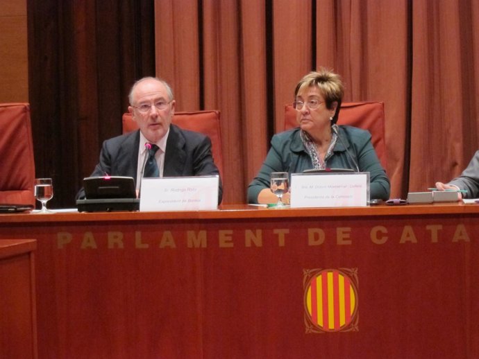 Rodrigo Rato (expresidente de Bankia) y Dolors Montserrat (diputada del PP)
