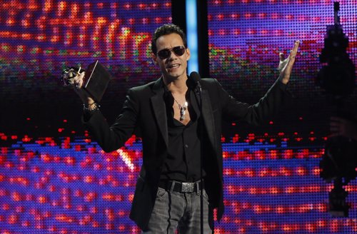 Marc Anthony accepts the award for record of the year for 