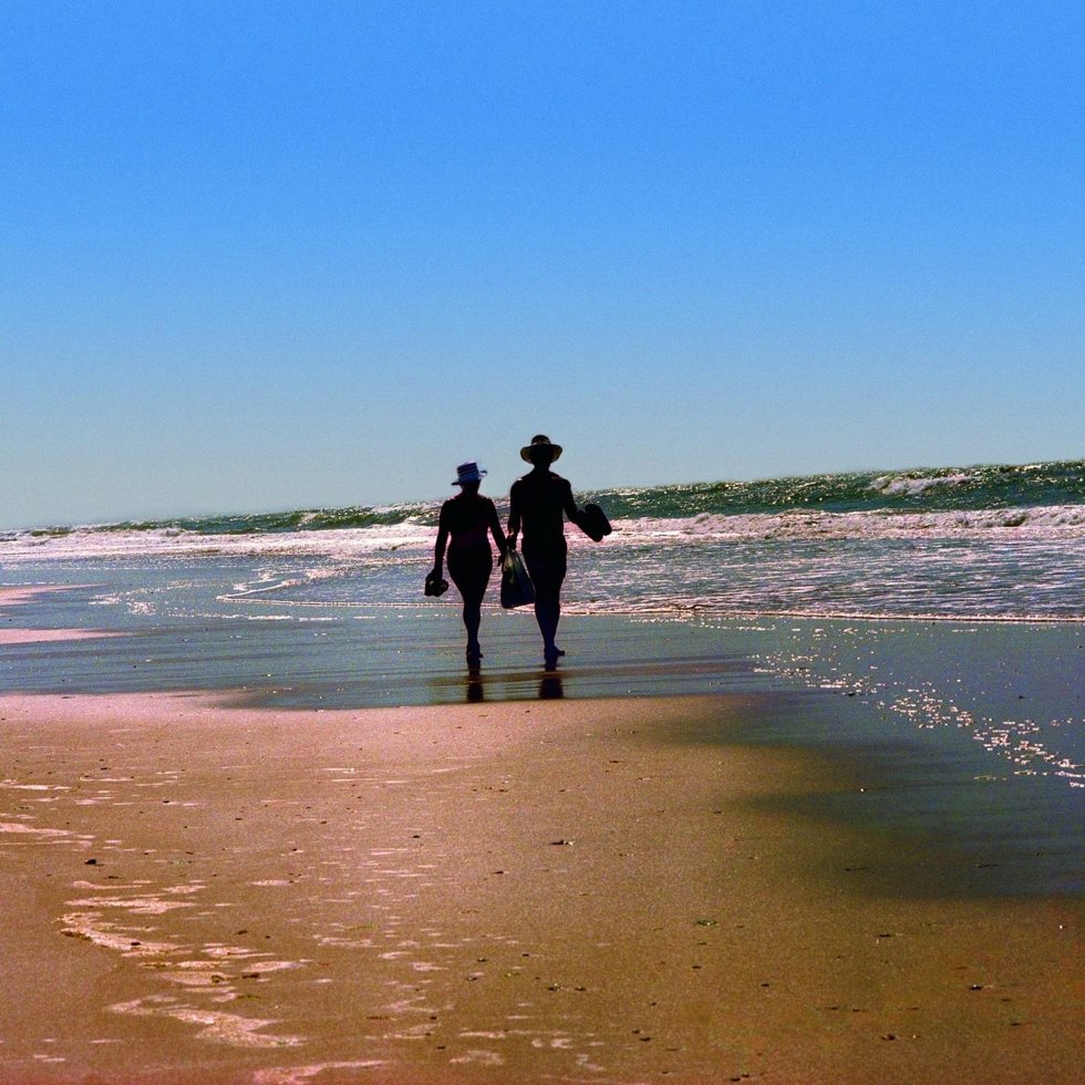 Extranjeros en una playa de Huelva.