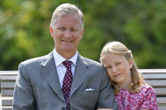 Crown Prince Philippe of Belgium and Princess Elisabeth pose during a photoshoot