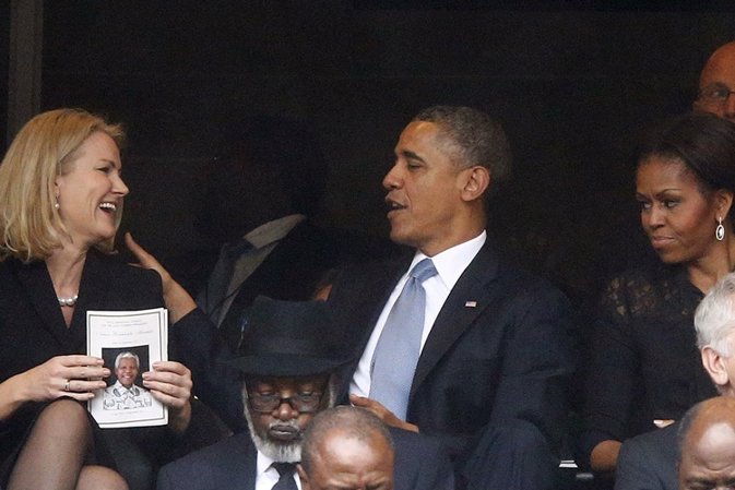 U.S. President Barack Obama (C) shares a laugh with Danish Prime Minister Helle 