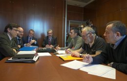 Torre (en el centro) al inicio de la reunión. 