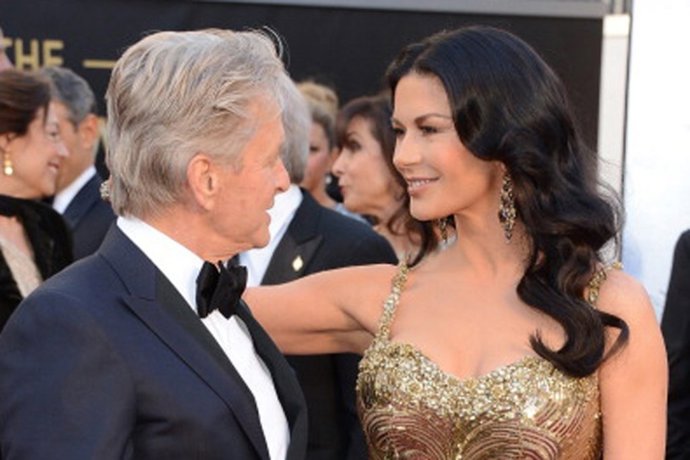 HOLLYWOOD, CA - FEBRUARY 24:  Actors Michael Douglas and Catherine Zeta-Jones ar