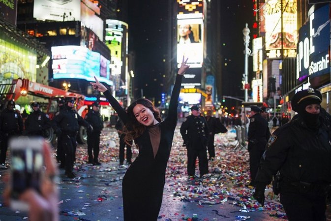 Diana Vy of Philadelphia strikes a pose as she is photographed by friends amid p
