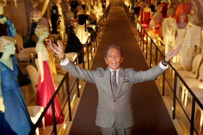 LONDON, ENGLAND - NOVEMBER 28:  Fashion designer Valentino Garavani poses beside