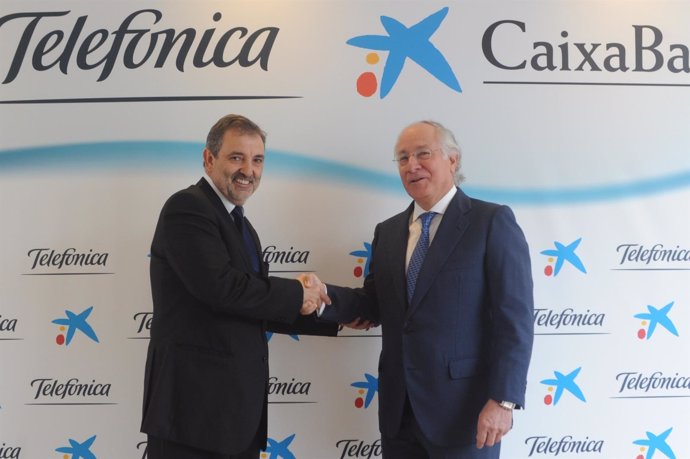 Luis Miguel Gilpérez (Telefónica) y Juan María Nin (CaixaBank)