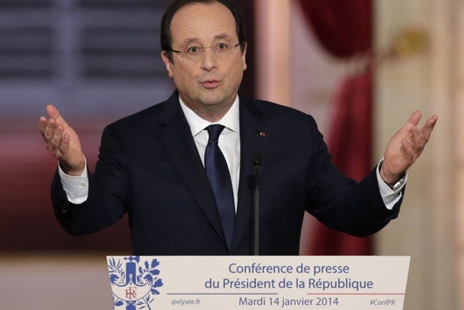 French President Francois Hollande addresses a news conference at the Elysee Pal