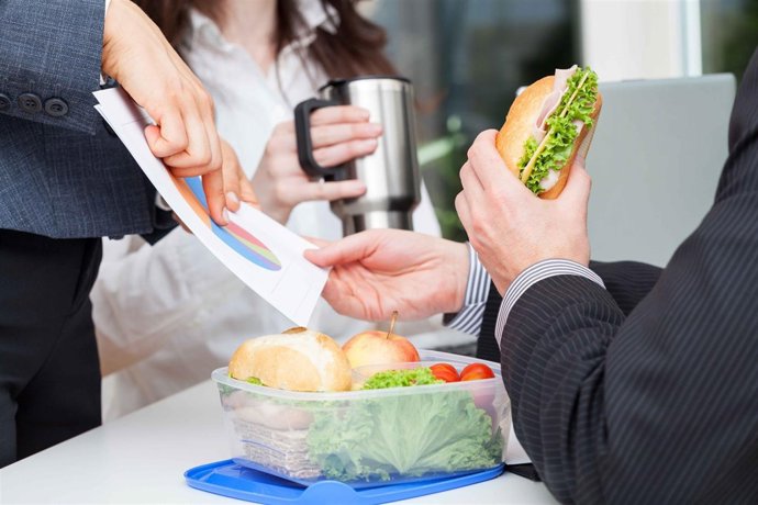 Business lunch at the desk in the office