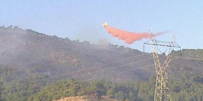 Medio aéro trabajando en incendio Gilet