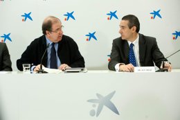 Herrera (I) y el director general de Caixabank