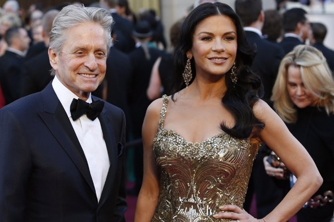 Catherine Zeta Jones and Michael Douglas arrive at the 85th Academy Awards in Ho