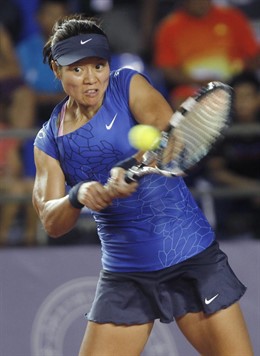 Na Li, durante un partido de exhibición en Tailandia