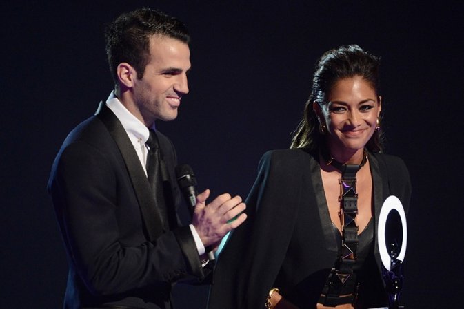 LONDON, ENGLAND - FEBRUARY 19:  Cesc Fabregas; Nicole Scherzinger presents the a
