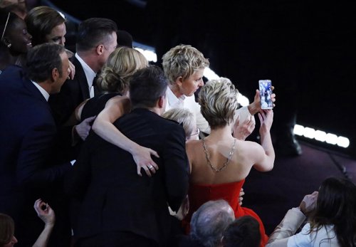 Host Ellen Degeneres takes a group picture at the Oscar Hollywood