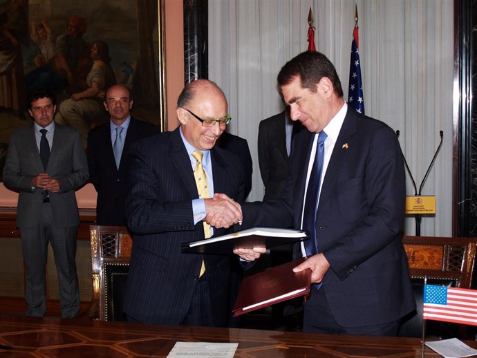 Cristóbal Montoro y Alan Solomont