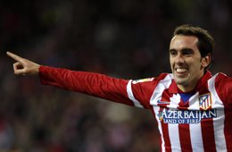 Godín celebra un gol con el Atlético de Madrid