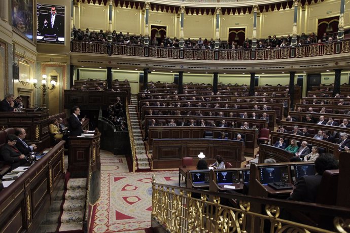 Diputados escuchando a Mariano Rajoy en el hemiciclo