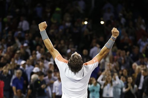 Nadal celebra su victoria sobre Raonic