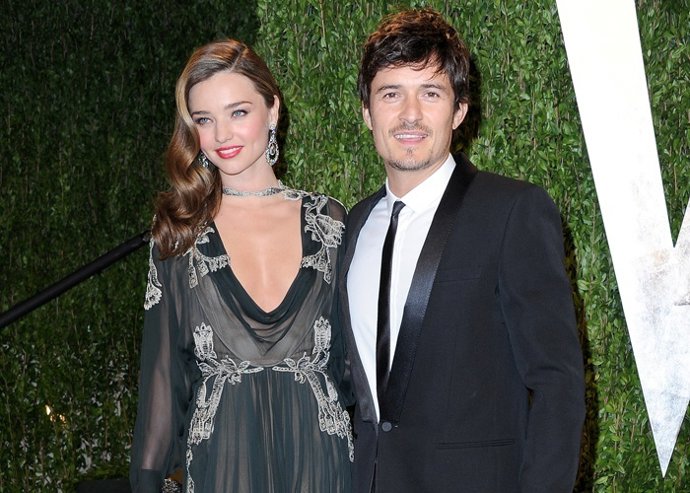   Model Miranda Kerr (L) And Actor Orlando Bloo