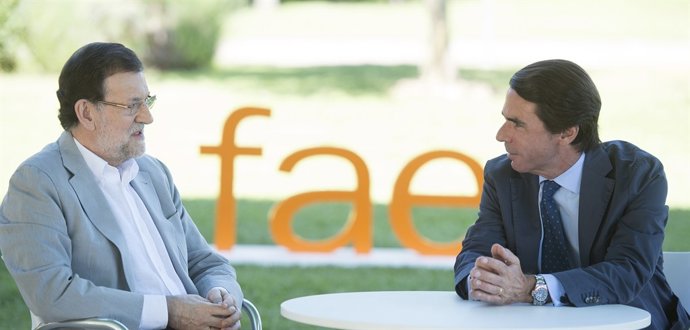 Mariano Rajoy y José María Aznar