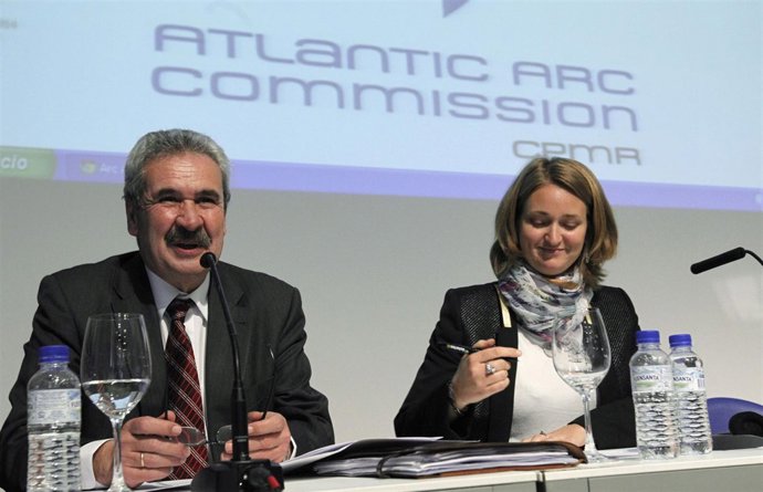 Graciano Torre, a la izquierda