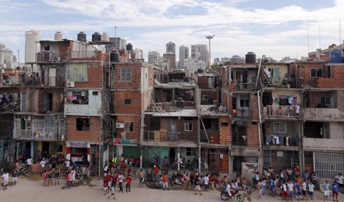 Residents are seen in the Villa 31 slum near the heart of Buenos Aires