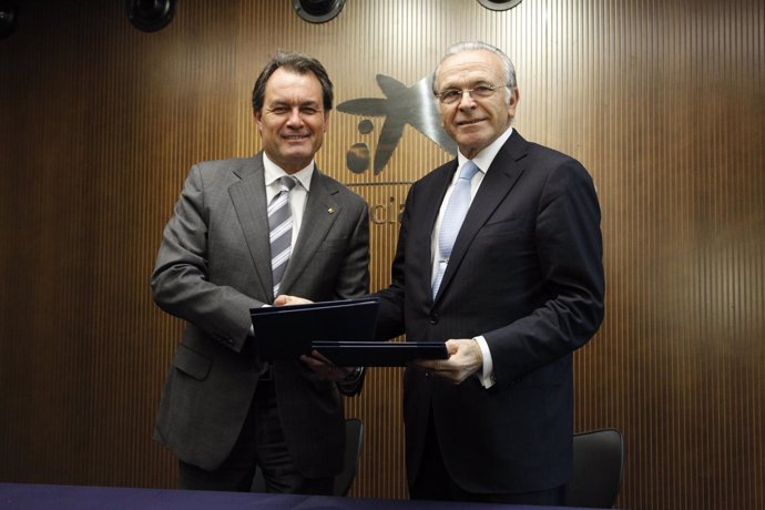 El presidente de la Generalitat, Artur Mas, y el de La Caixa, Isidre Fainé