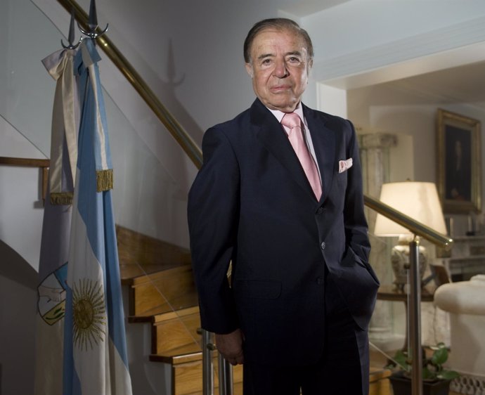 Former Argentine President and current senator Carlos Menem, 79, poses after an 