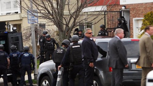 LONG BEACH, N.Y. - April 22, 2014:   This is a picture of  police by the house a