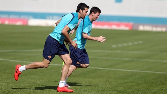 Leo Messi Sergio Busquets Barcelona entrenamiento