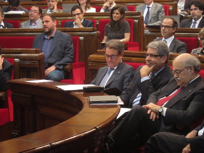 Artur Mas, Francesc Homs y Andreu Mas-Colell, en el Parlament