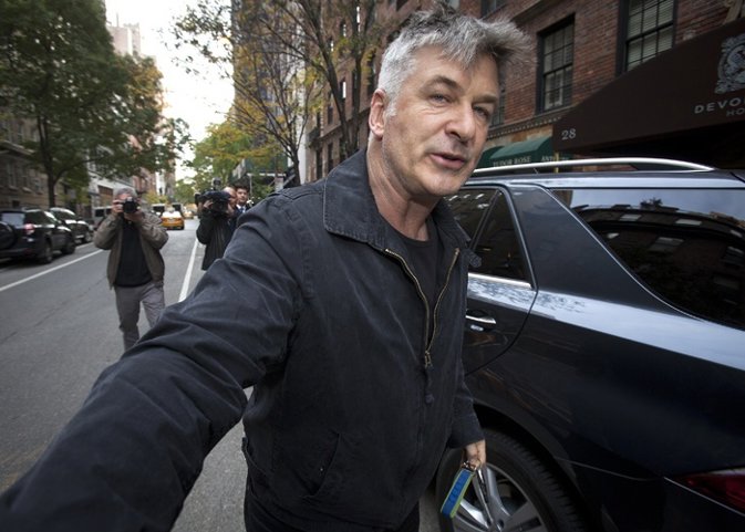 Actor Alec Baldwin shoves a photographer and tells 