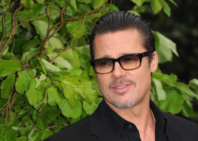Brad Pitt attends a private reception as costumes and