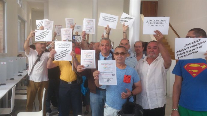 Protesta de varios de los despedidos del ERE de Mercasevilla. 