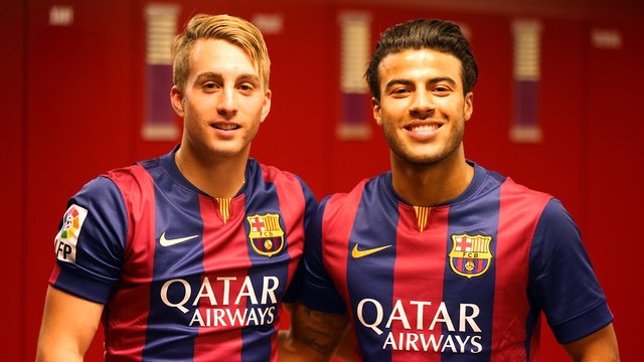 Los jugadores del FC Barcelona Gerard Deulofeu y Rafinha Alcántara