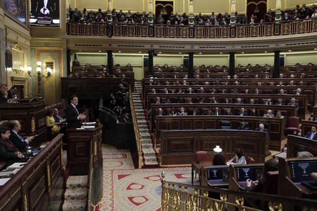 Diputados escuchando a Mariano Rajoy en el hemiciclo