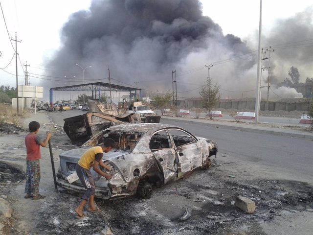Vehículo quemado en la ciudad de Mosul