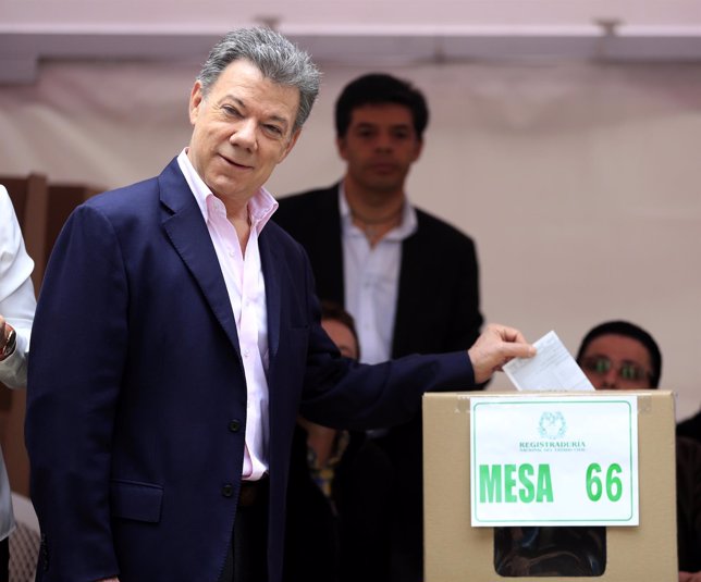 President Juan Manuel Santos casts his vote in Bogota