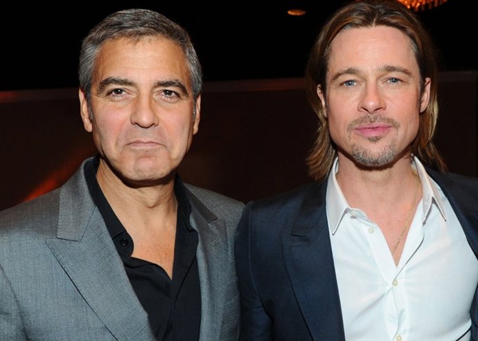 Actors George Clooney and Brad Pitt attend