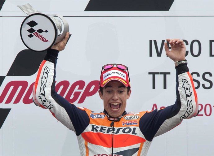 Honda MotoGP rider Marc Marquez of Spain celebrates on the podium after winning 