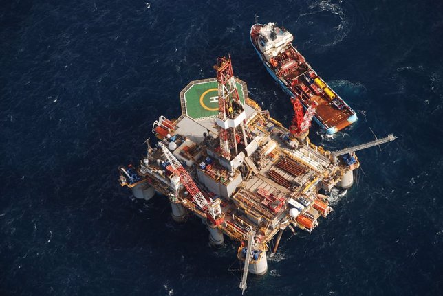 The Ocean Guardian semi-submersible drilling rig floats tethered to the sea floo
