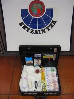 Maletín con billetes tintados