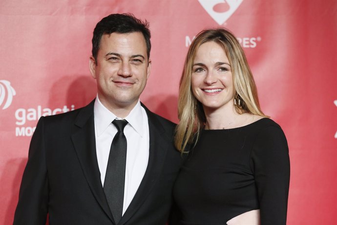 Television host Kimmel and comedy writer McNearney pose at the 2013 MusiCares Pe