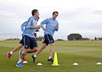 Godín y Giménez se reincorporan a los entrenamientos del Atlético